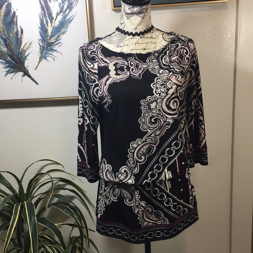 White House Black market. Elastic waist line poly spandex blouse.